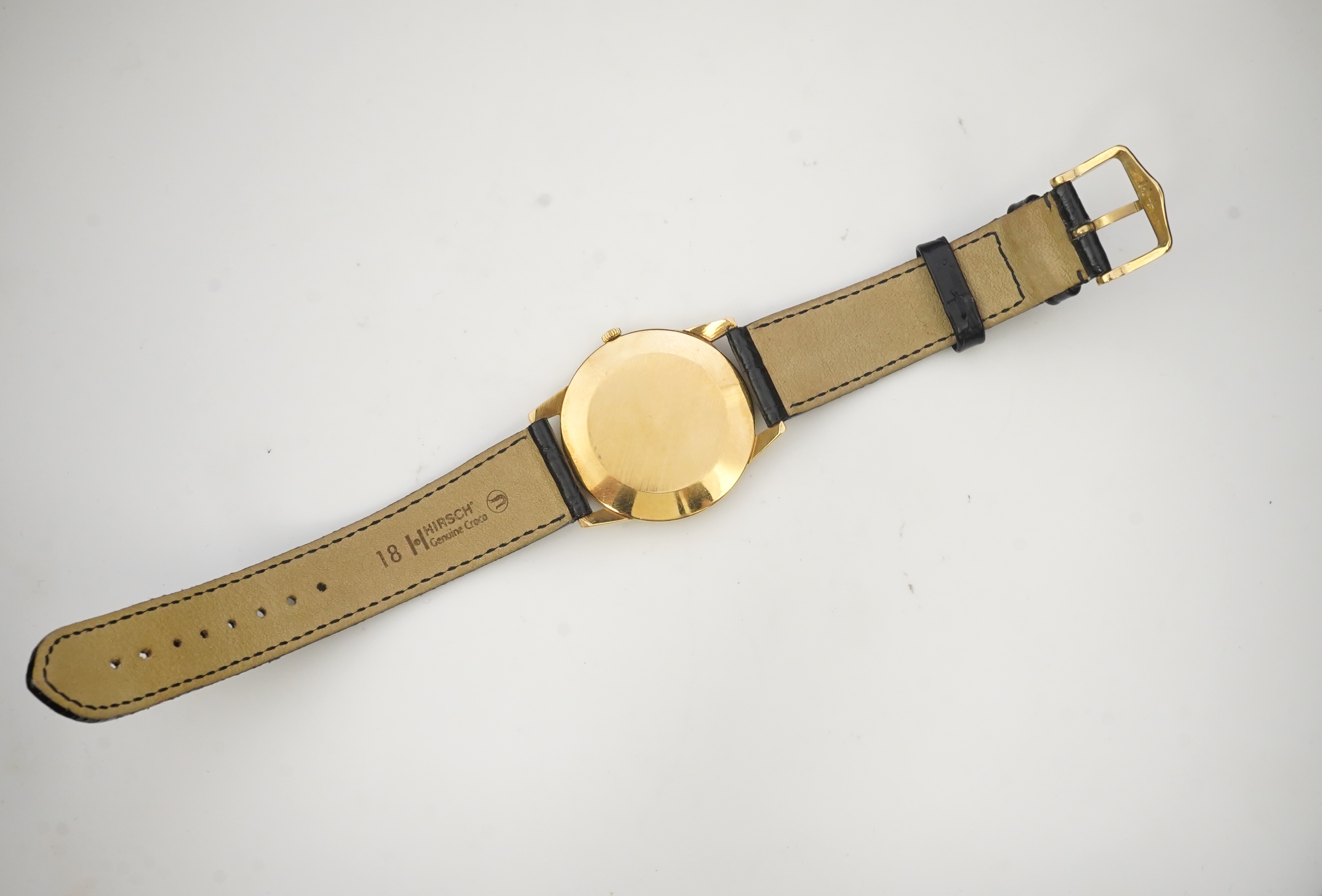 A gentleman's 18ct gold Jaeger LeCoultre manual wind dress wrist watch, on a later associated leather strap